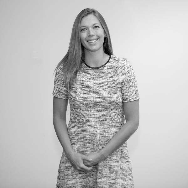 A smiling woman with long hair. 